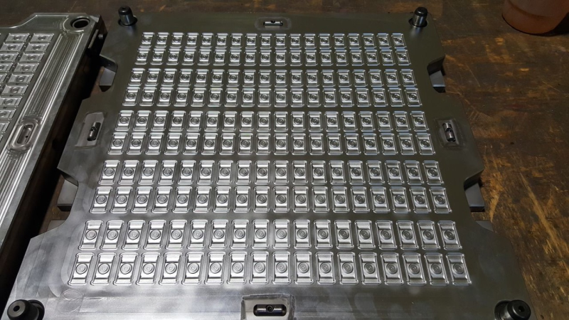 Compression moulds for rubber